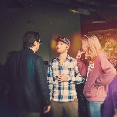 people talking infront of bar